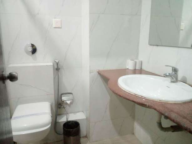 Imagen de la habitación del Hotel Bodhgaya Gautam. Foto 4