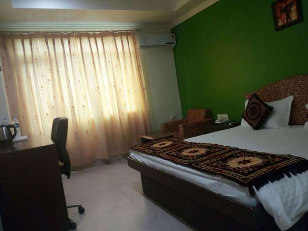 Imagen de la habitación del Hotel Bodhgaya Gautam. Foto 5