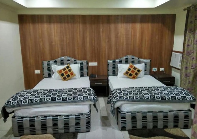 Imagen de la habitación del Hotel Bodhgaya Gautam. Foto 6
