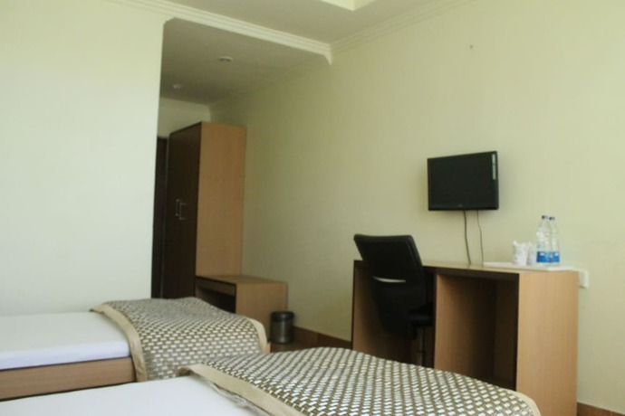 Imagen de la habitación del Hotel Bodhgaya Gautam. Foto 12
