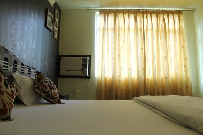 Imagen de la habitación del Hotel Bodhgaya Gautam. Foto 14