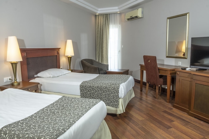 Imagen de la habitación del Hotel Bodrum Holiday Resortandspa. Foto 11