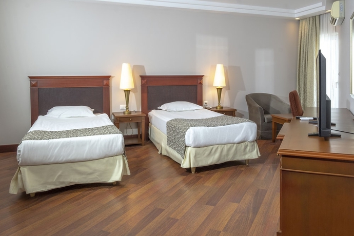 Imagen de la habitación del Hotel Bodrum Holiday Resortandspa. Foto 12