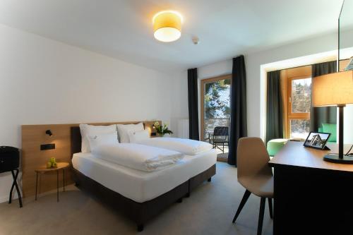 Imagen de la habitación del Hotel Bo&egrave; Sport and Nature. Foto 9