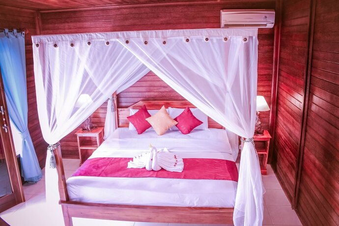 Imagen de la habitación del Hotel Boga Segara Villa and Resto. Foto 14
