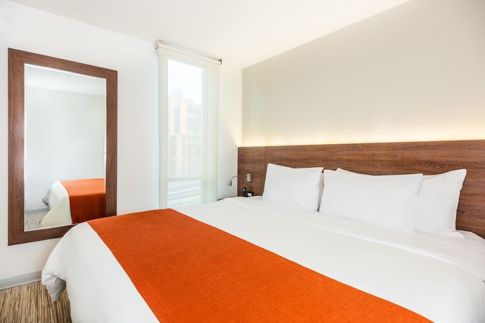 Imagen de la habitación del Hotel Bogotá 100 Design. Foto 8