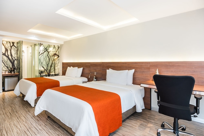 Imagen de la habitación del Hotel Bogotá 100 Design. Foto 12