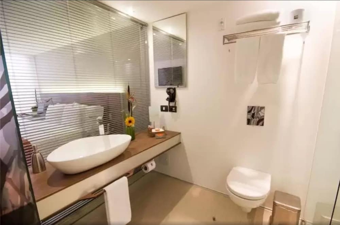 Imagen de la habitación del Hotel Bogotá 100 Design. Foto 17