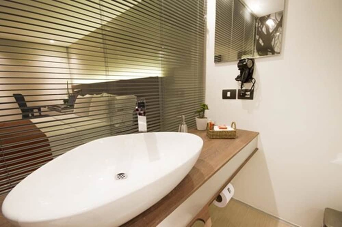 Imagen de la habitación del Hotel Bogotá 100 Design. Foto 18