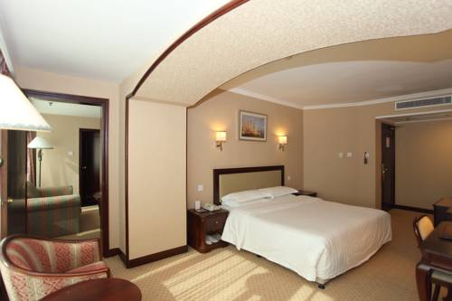 Imagen de la habitación del Hotel Bohai Pearl. Foto 15