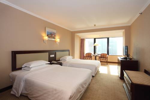 Imagen de la habitación del Hotel Bohai Pearl. Foto 16