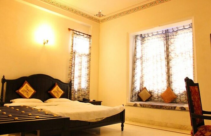 Imagen de la habitación del Hotel Boheda Palace. Foto 21