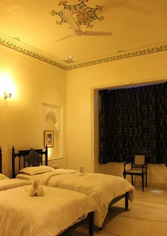 Imagen de la habitación del Hotel Boheda Palace. Foto 31