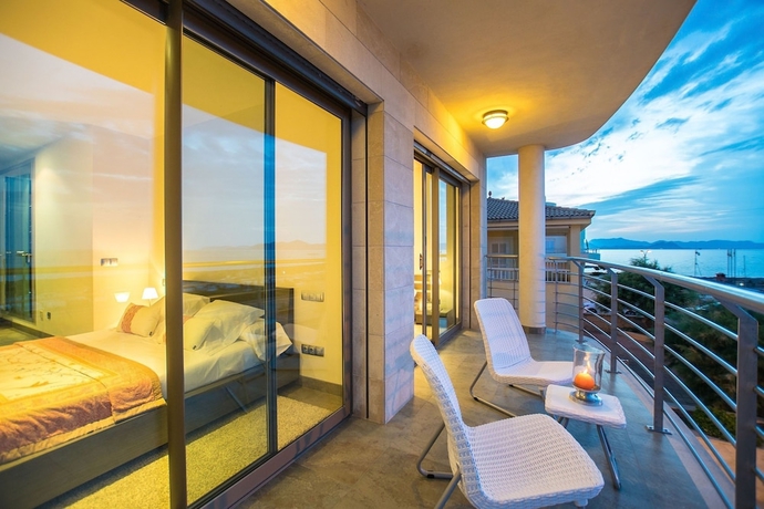 Imagen de la habitación del Hotel Bohemi in Son Serra de Marina. Foto 7
