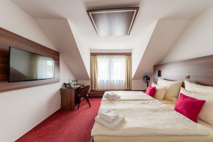 Imagen de la habitación del Hotel Bohemia Inn. Foto 6