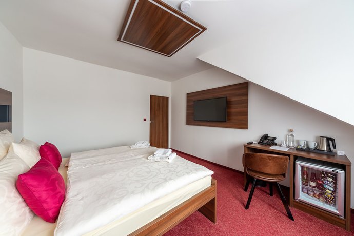 Imagen de la habitación del Hotel Bohemia Inn. Foto 8