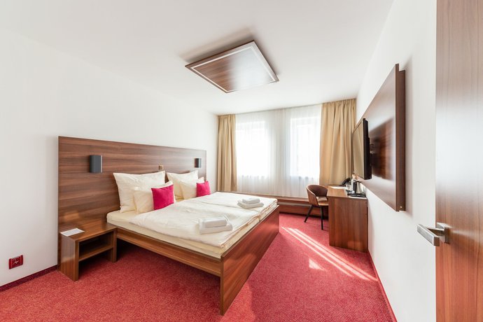 Imagen de la habitación del Hotel Bohemia Inn. Foto 9