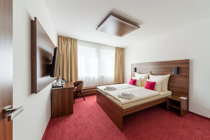 Imagen de la habitación del Hotel Bohemia Inn. Foto 13