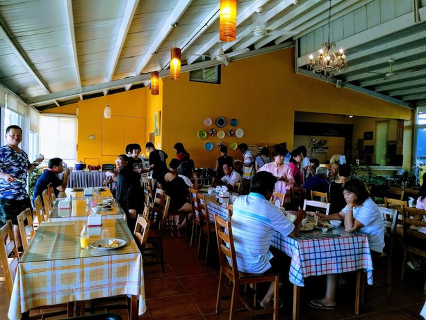 Imagen del bar/restaurante del Hotel Bohemian Holiday Inn. Foto 3