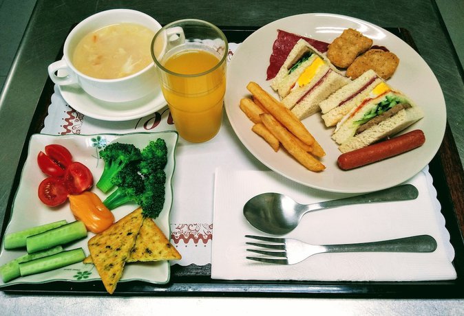 Imagen del bar/restaurante del Hotel Bohemian Holiday Inn. Foto 5