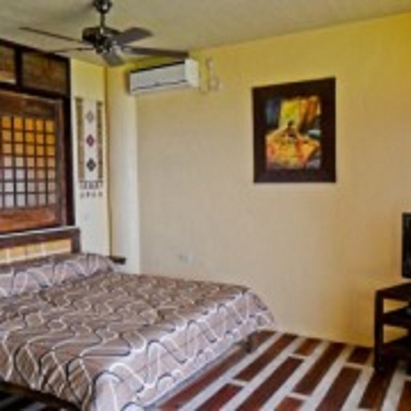 Imagen de la habitación del Hotel Bohol Bee Farm Resort. Foto 16