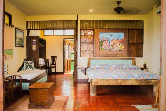 Imagen de la habitación del Hotel Bohol Bee Farm Resort. Foto 18