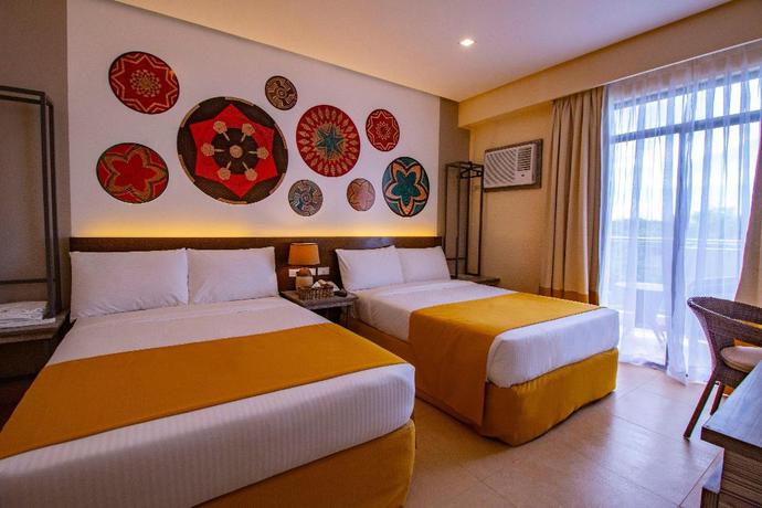 Imagen de la habitación del Hotel Bohol Shores. Foto 6