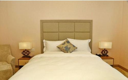 Imagen de la habitación del Hotel Boke Boutique Shenzhen Longgang. Foto 12