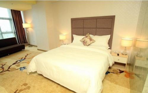 Imagen de la habitación del Hotel Boke Boutique Shenzhen Longgang. Foto 13