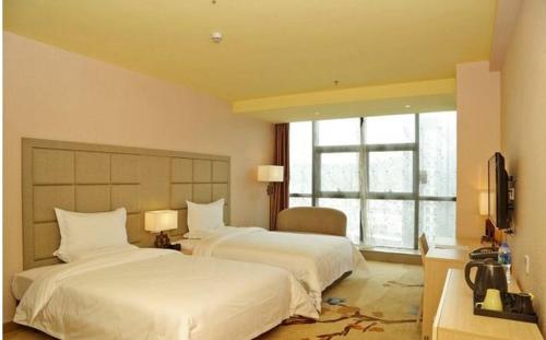 Imagen de la habitación del Hotel Boke Boutique Shenzhen Longgang. Foto 14