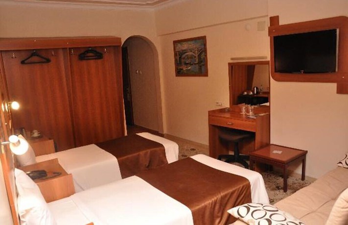 Imagen de la habitación del Hotel Bolat. Foto 11