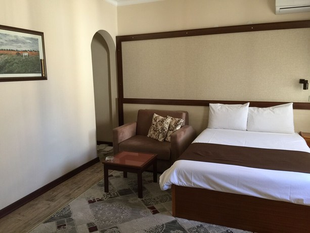Imagen de la habitación del Hotel Bolat. Foto 19