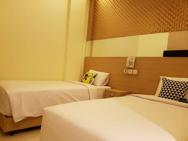 Imagen de la habitación del Hotel Bold Jakarta. Foto 16