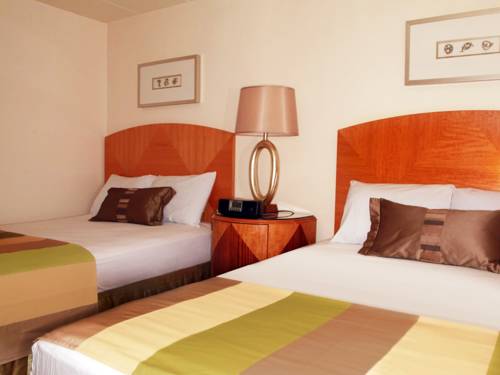 Imagen de la habitación del Hotel Bolero Resort. Foto 13