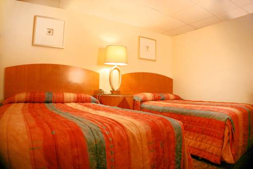 Imagen de la habitación del Hotel Bolero Resort. Foto 15