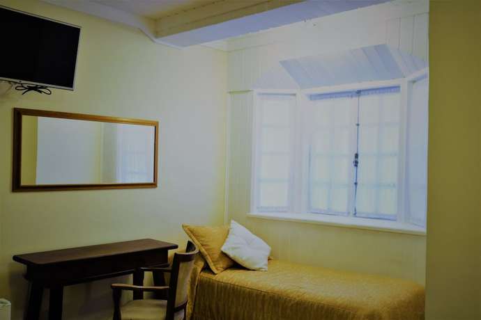Imagen de la habitación del Hotel Bologna, Campos do Jordao. Foto 4