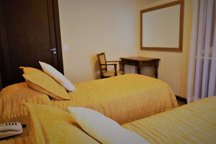 Imagen de la habitación del Hotel Bologna, Campos do Jordao. Foto 11