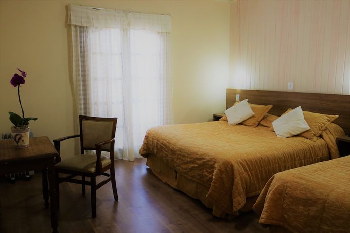 Imagen de la habitación del Hotel Bologna, Campos do Jordao. Foto 12