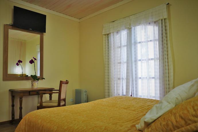 Imagen de la habitación del Hotel Bologna, Campos do Jordao. Foto 14