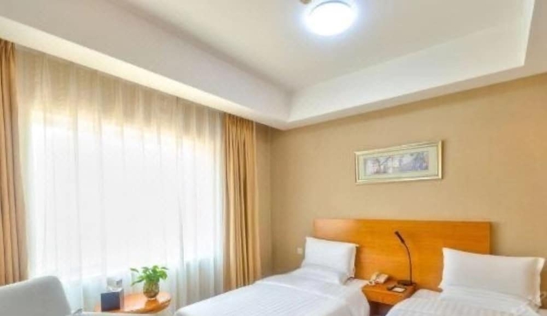 Imagen de la habitación del Hotel Bolt Dalian. Foto 4