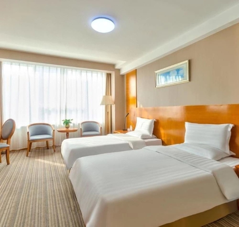 Imagen de la habitación del Hotel Bolt Dalian. Foto 5