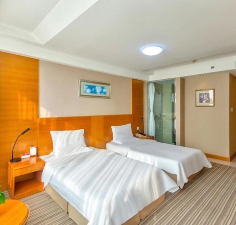 Imagen de la habitación del Hotel Bolt Dalian. Foto 6