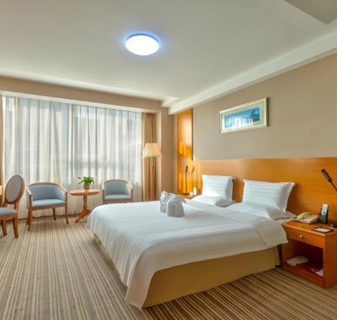 Imagen de la habitación del Hotel Bolt Dalian. Foto 8