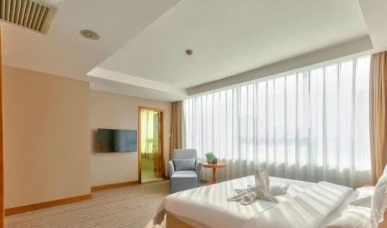 Imagen de la habitación del Hotel Bolt Dalian. Foto 9