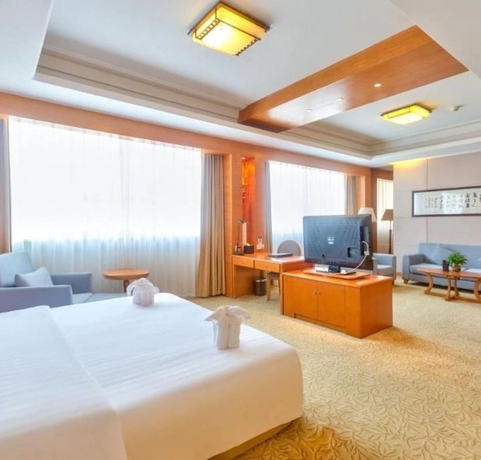 Imagen de la habitación del Hotel Bolt Dalian. Foto 10