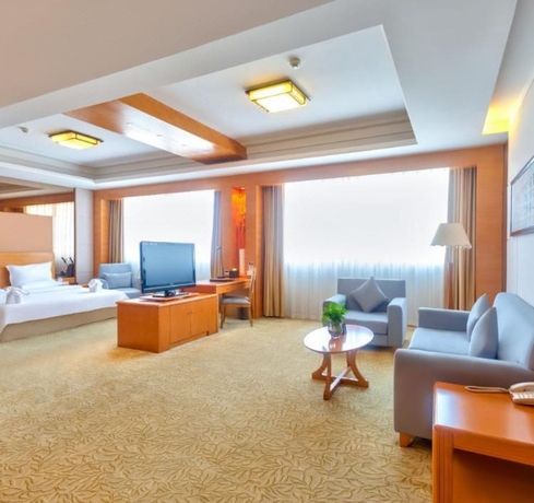 Imagen de la habitación del Hotel Bolt Dalian. Foto 11