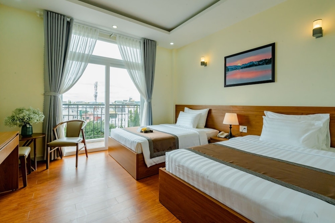 Imagen de la habitación del Hotel BomBo Dalat. Foto 2