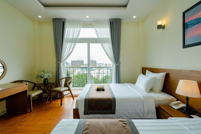 Imagen de la habitación del Hotel BomBo Dalat. Foto 3