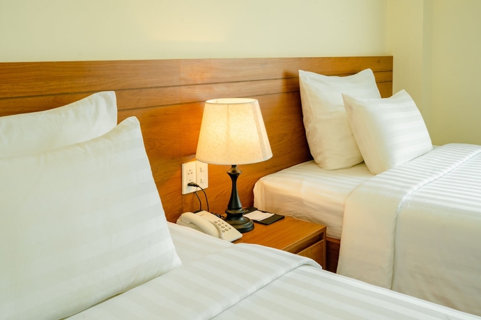 Imagen de la habitación del Hotel BomBo Dalat. Foto 9