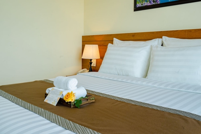 Imagen de la habitación del Hotel BomBo Dalat. Foto 10